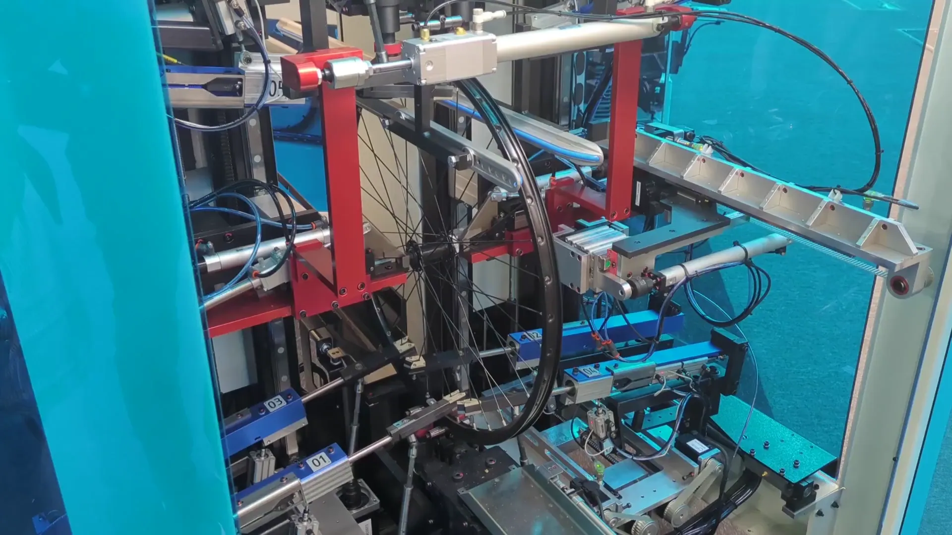 The Holland Mechanics Robot OT, a high-end wheel truing machine in action.